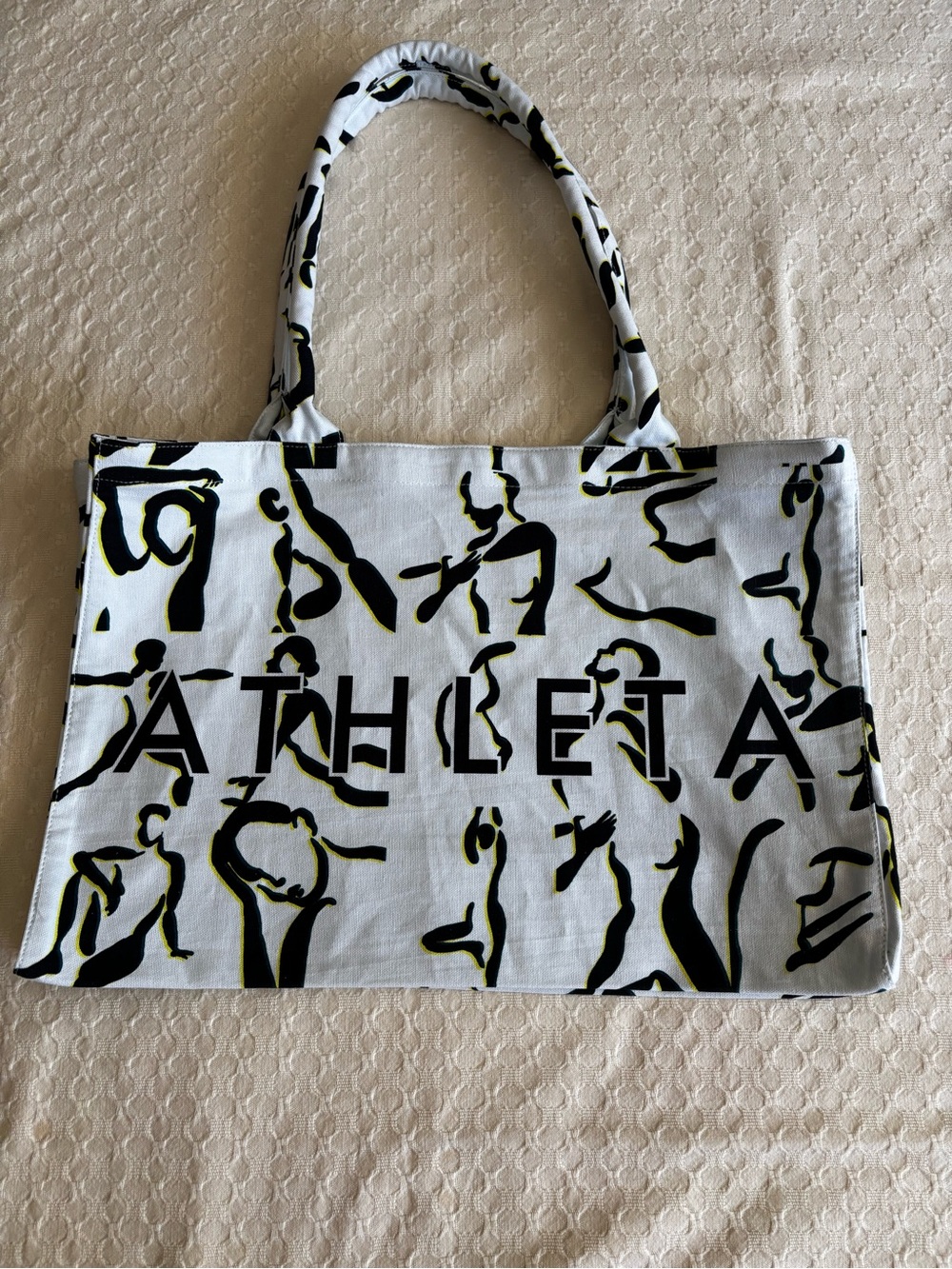 Athleta White Tote with Black & Yellow Graphic Figures